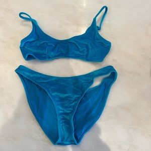 Triangl Andrea Bikini, top size is small plus and the bottoms are medium